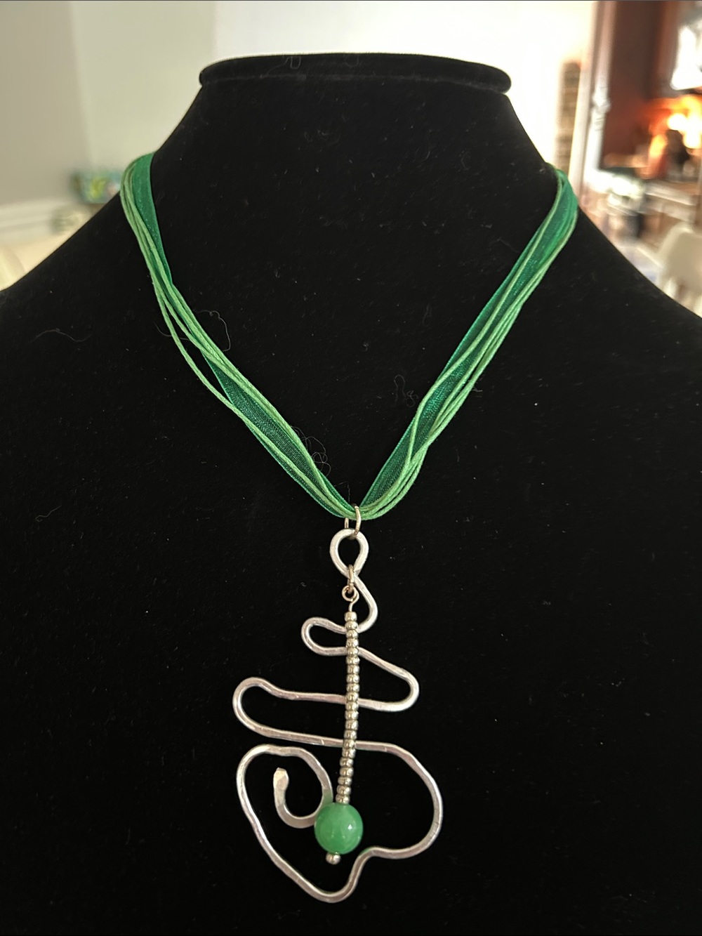 Green Multi-Strand Ribbon Necklace with Silver Abstract Pendant